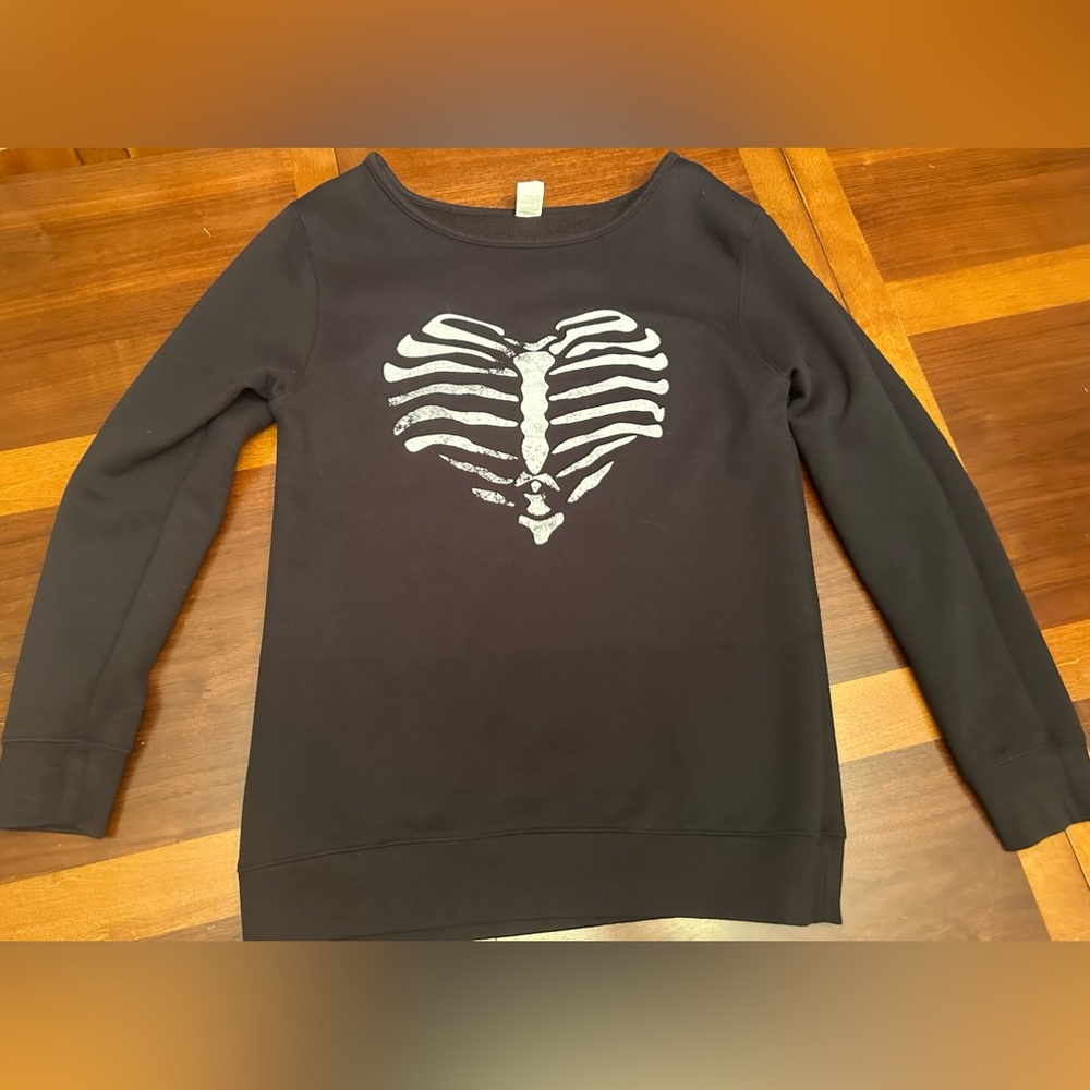 Awkward styles sweater xl but fits more like a large